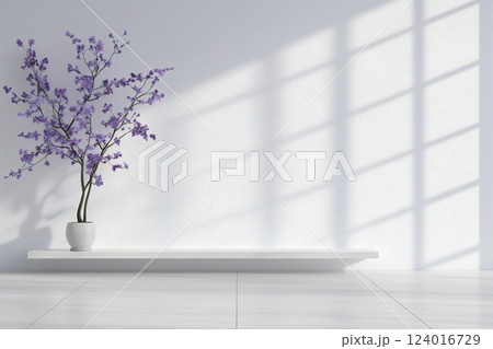 A white wall with a purple tree in a white vase A white wall with a purple tree in a white vase 124016729