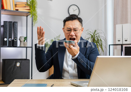 Angry businessman CEO making smartphone call conversation at office, quarrel conflict negotiation Angry businessman CEO making smartphone call conversation at office, quarrel conflict negotiation 124018108