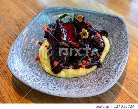 asado veal ribs simmered at low temperatures 124018724