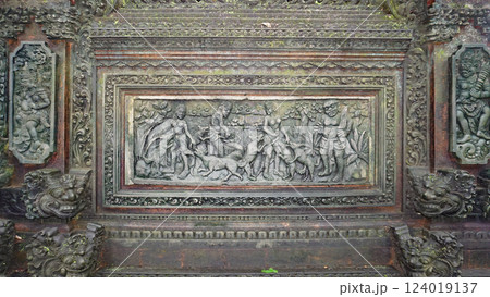 Fragment of bas-relief featuring monkeys on Padangtegal Great Temple of Death or Pura Dalem Agung Padangtegal in the Sacred Monkey Forest of Padangtegal, Ubud, Bali, Indonesia Fragment of bas-relief featuring monkeys on Padangtegal Great Temple of Death or Pura Dalem Agung Padangtegal in the Sacred Monkey Forest of Padangtegal, Ubud, Bali, Indonesia 124019137