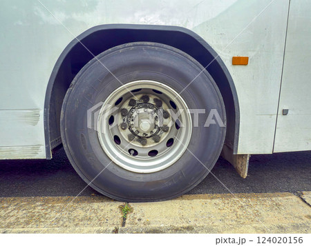 Close up image of a passenger bus tyre and rim 124020156