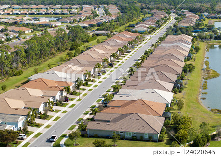 Rich neighborhood with expensive residential homes in southwest Florida. Wealthy suburban area 124020645