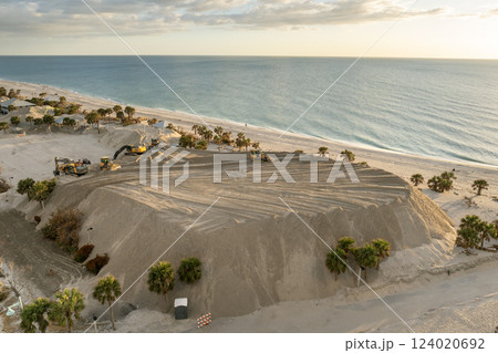 Piles of sand at Charlotte County sand recipient site at Englewood Beach on Manasota Key as hurricane Milton aftermath cleanup Piles of sand at Charlotte County sand recipient site at Englewood Beach on Manasota Key as hurricane Milton aftermath cleanup 124020692