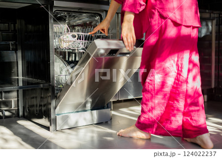 Loading the dishwasher 124022237