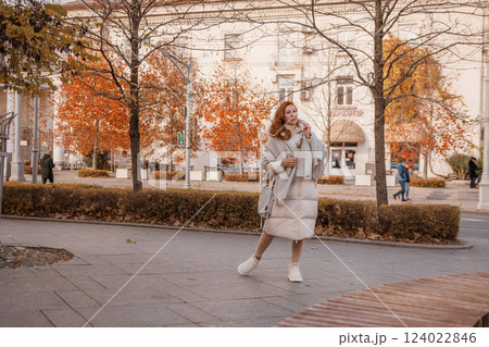 Woman Autumn Coat Walking City Street: Fall Fashion, Urban Stroll, Casual Style. Woman Autumn Coat Walking City Street: Fall Fashion, Urban Stroll, Casual Style. 124022846