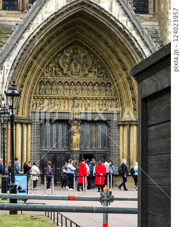 London, United Kingdom - 06.05.2019: Tourists visit Westminster Abbey. The building is in the Gothic style 124023957