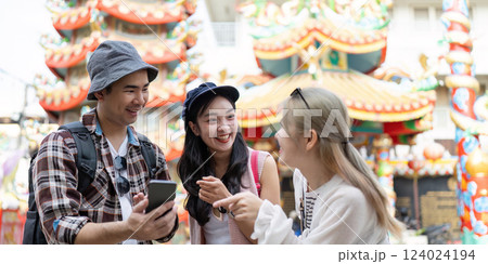 Travel adventures with friends at a vibrant festival colorful streets candid moments joyful atmosphere 124024194