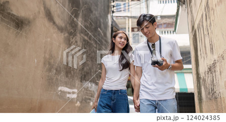 Couple hidden alleys city streets travel urban environment candid viewpoint adventure concept Couple hidden alleys city streets travel urban environment candid viewpoint adventure concept 124024385