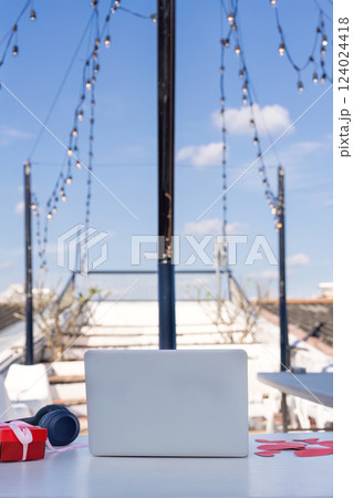 A productive workspace with modern tech outdoor rooftop bright daylight elevated perspective work life balance A productive workspace with modern tech outdoor rooftop bright daylight elevated perspective work life balance 124024418