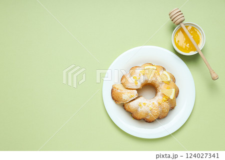 Tasty bake food concept - delicious lemon cake 124027341