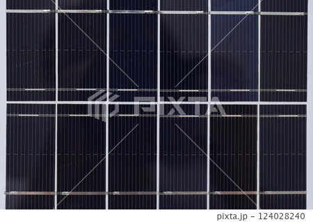 A close-up view of a portable black solar panel 124028240