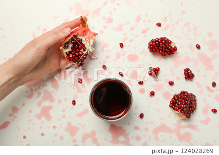Pomegranate juice, tasty and delicious beverage, fresh drink Pomegranate juice, tasty and delicious beverage, fresh drink 124028269