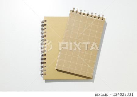 Two stylish notebooks on a white background 124028331
