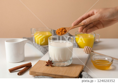 Moon milk, milk with turmeric, concept of different drinks 124028352