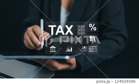 Tax documents and savings, Represent the concept of tax return preparation and financial management, Income tax, Businesswoman calculates taxes using calculator and tablet, Submit request refund tax. 124029306