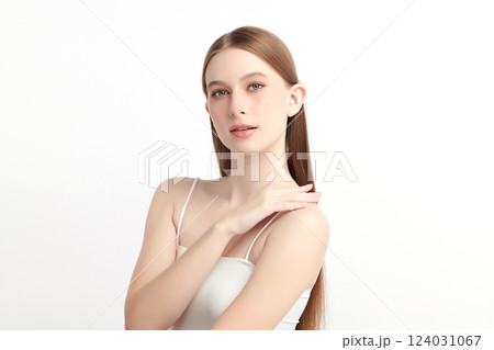 A beautiful young woman with clean, fresh skin against a white background. Skincare, facial treatment, cosmetology, beauty, and spa themes. An elegant portrait of an woman. A beautiful young woman with clean, fresh skin against a white background. Skincare, facial treatment, cosmetology, beauty, and spa themes. An elegant portrait of an woman. 124031067