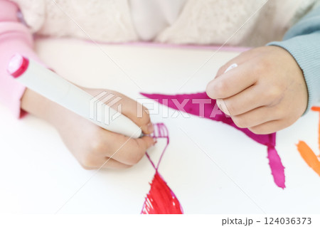 Cute little preschooler child drawing at home Cute little preschooler child drawing at home 124036373