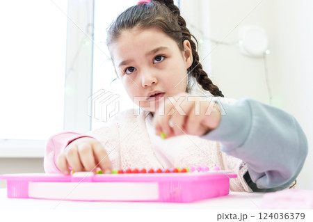 girl plays educational games, 124036379