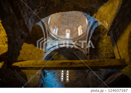 The interior of an old chapel inside the fortress of Kyrenia in Northern Cyprus. Ancient stone walls and sacred architecture reflect the historical and spiritual heritage of the site The interior of an old chapel inside the fortress of Kyrenia in Northern Cyprus. Ancient stone walls and sacred architecture reflect the historical and spiritual heritage of the site 124037397