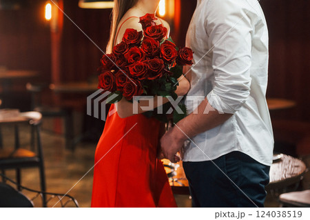 Embracing each other. Romantic couple have dinner in the restaurant Embracing each other. Romantic couple have dinner in the restaurant 124038519