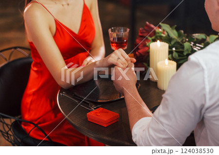 With drinks. Romantic couple have dinner in the restaurant 124038530