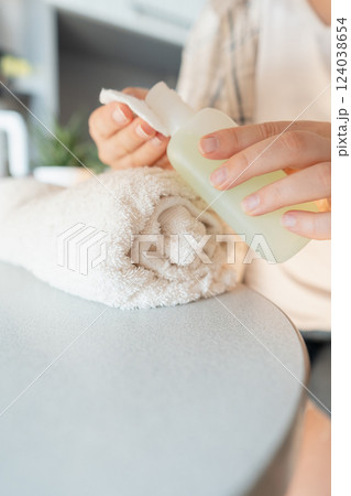 Step by step home manicure guide on nail cleaning polish application and cuticle care for a professional look without a salon visit. 124038654