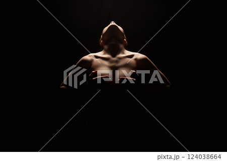 Nude Woman silhouette in dark. Beautiful Naked Body Girl Nude Woman silhouette in dark. Beautiful Naked Body Girl 124038664