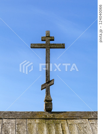 Old wooden cross at the top of a church Old wooden cross at the top of a church 124040066