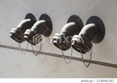 Fire hydrants on a white wall 124040161