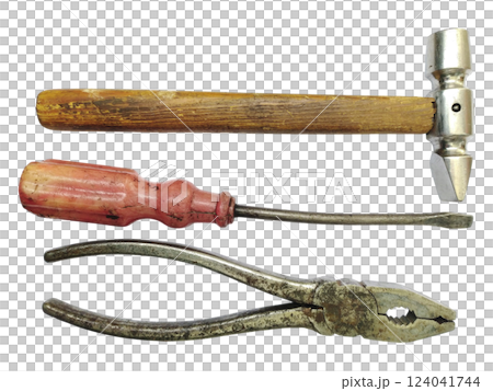 Vintage tools hammer, screwdriver, pliers. A classic still life showcasing aged craftsmanship. Perfect for DIY, repair, construction, or retro themes. Evokes feelings of nostalgia and hard work. Vintage tools hammer, screwdriver, pliers. A classic still life showcasing aged craftsmanship. Perfect for DIY, repair, construction, or retro themes. Evokes feelings of nostalgia and hard work. 124041744