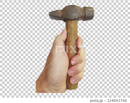 Closeup of a hand firmly gripping a weathered claw hammer.  The image evokes themes of craftsmanship, hard work, and construction. 124041748