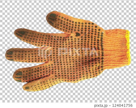 A wellworn orange work glove, showcasing its textured surface and darkcolored grip dots, lies against a clean white background. The image evokes themes of hard work, manual labor, and resilience. 124041756