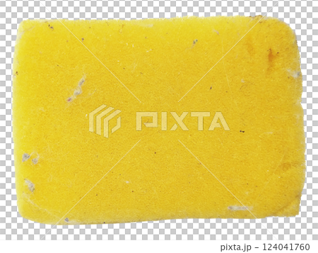 A wellused yellow cleaning sponge, slightly soiled, sits on a stark white background. 124041760