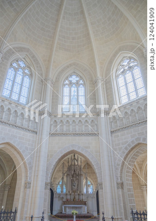 The striking interior of the Schwarzenberg Tomb features elegant architecture, large stained glass windows, and a central altar in Domanin, Czechia, creating a serene atmosphere. The striking interior of the Schwarzenberg Tomb features elegant architecture, large stained glass windows, and a central altar in Domanin, Czechia, creating a serene atmosphere. 124041909