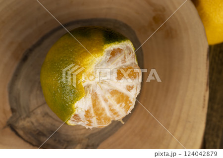 peeled orange ripe tangerines on the table peeled orange ripe tangerines on the table 124042879