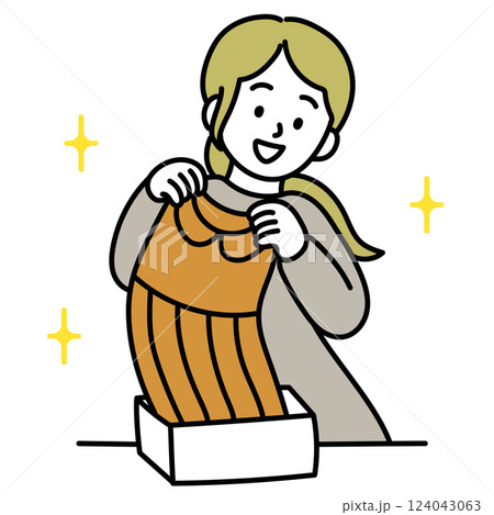 洋服を購入して箱から出している女性のベクターイラスト 洋服を購入して箱から出している女性のベクターイラスト 124043063