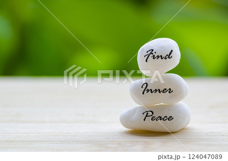 Find Inner Peace text on the white Zen stones. Inner peace concept 124047089