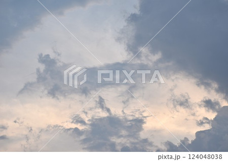 white and dark rain cloud floating on sky in evening 124048038