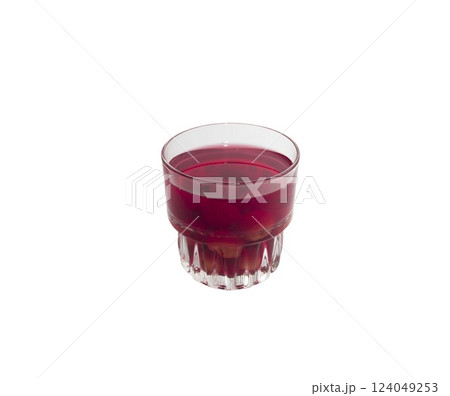 Sweet refreshing berry compote from ripe cherries in a glass isolated on white background. 124049253