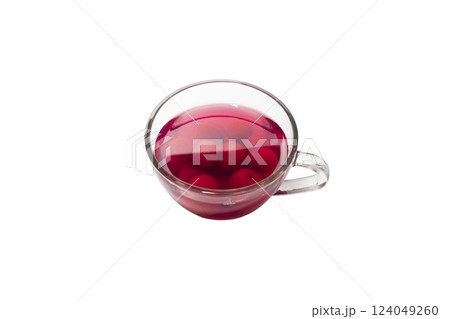 Sweet refreshing berry compote from ripe cherries in a glass isolated on white background. Sweet refreshing berry compote from ripe cherries in a glass isolated on white background. 124049260