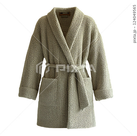 Luxurious beige bathrobe, textured knit fabric.  Perfect for spa, hotel, or home decor.  Relaxation and comfort concept. Minimalist, stylish design. Ideal for websites, blogs, and advertising. 124049565