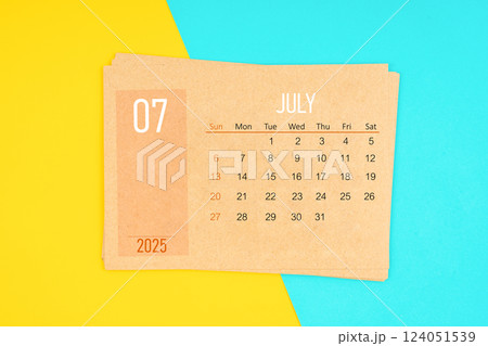 calendar card for July 2025 year on yellow and blue background. calendar card for July 2025 year on yellow and blue background. 124051539