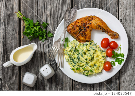 colcannon with kale with roasted chicken leg 124053547
