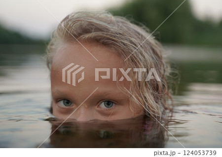 Mysterious Gaze Above Water Mysterious Gaze Above Water 124053739