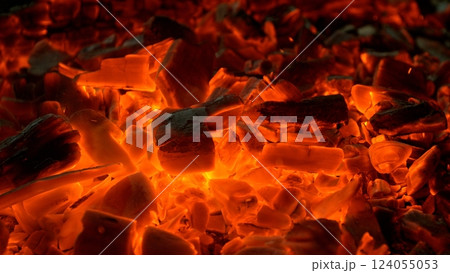 Close-up of Hot Embers with Flying Sparks . Concept of heating grills or ovens 124055053