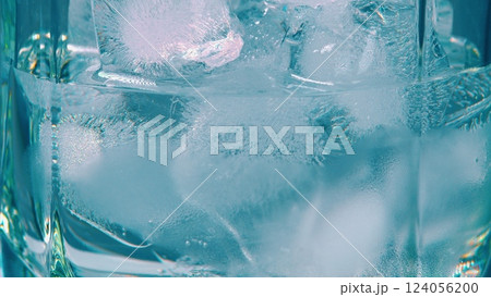 Take pleasure in savoring a Refreshing Glass of IceCold Water Filled with Ice Cubes on a Warm Day 124056200