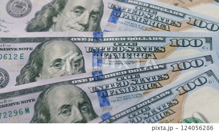 A Detailed CloseUp of U.S. Hundred Dollar Bills and Their Significance in the Economy 124056286