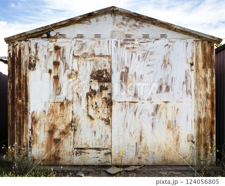 old metal warehouse door, hangar old metal warehouse door, hangar 124056805