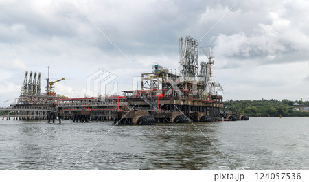 Industrial oil and gas platform situated in a coastal waterway 124057536