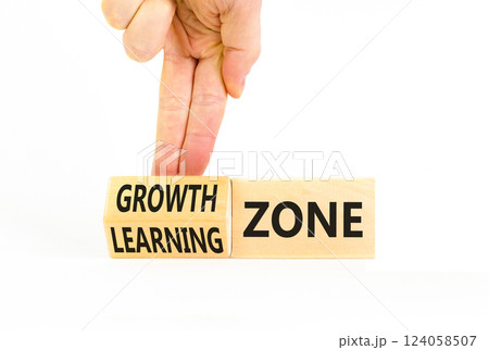 Learning or growth zone symbol. Concept words Learning zone Growth zone on wooden cubes. Beautiful white table white background. Psychologist hand. Business learning or growth zone concept. Copy space 124058507